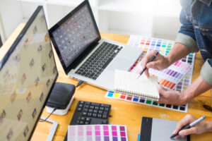 Graphic,Designer,Team,Working,On,Web,Design,Using,Color,Swatches